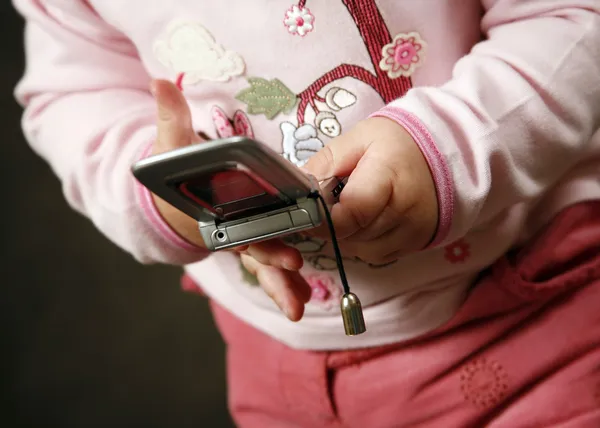 Дитина з телефоном — стокове фото