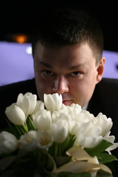 Groom with a bouquet — Stock Photo, Image