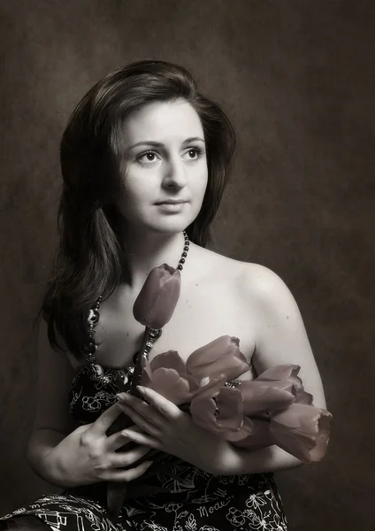 Portrait with spring flowers — Stock Photo, Image