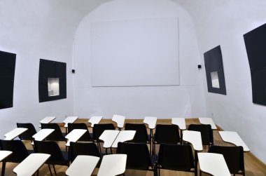 Screening room with chairs and display clipart