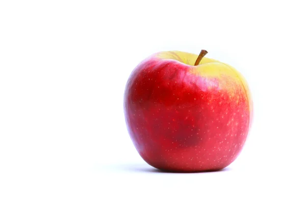 Μήλο σε λευκό. — Stockfoto