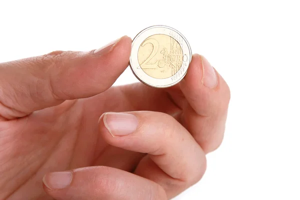 Hand holding a coin. — Stock Photo, Image
