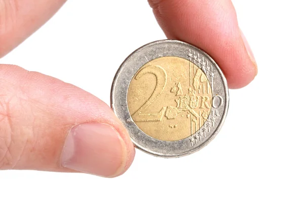 stock image Hand holding a coin.