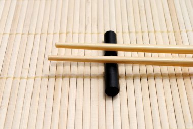 Bambu Amerikan Servisi arka planda Japon yemek çubukları