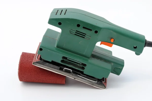 Green wood sander with sandpaper roll — Stock Photo, Image