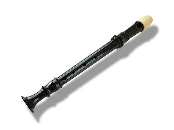 Uma flauta preta e branca no branco — Fotografia de Stock
