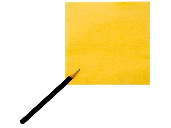 De gele notitie en het zwart potlood — Stockfoto