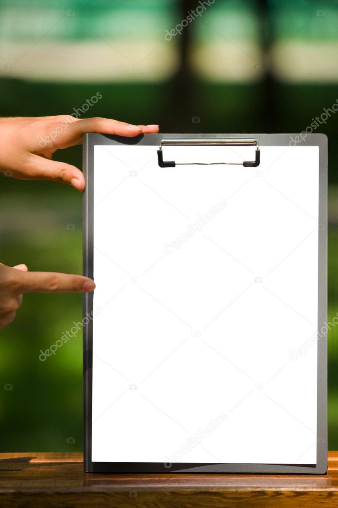 The clipboard with a sheet of paper