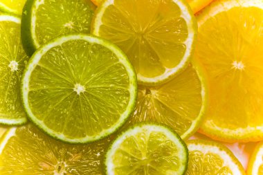 Slices of the orange, the lime and the lemon