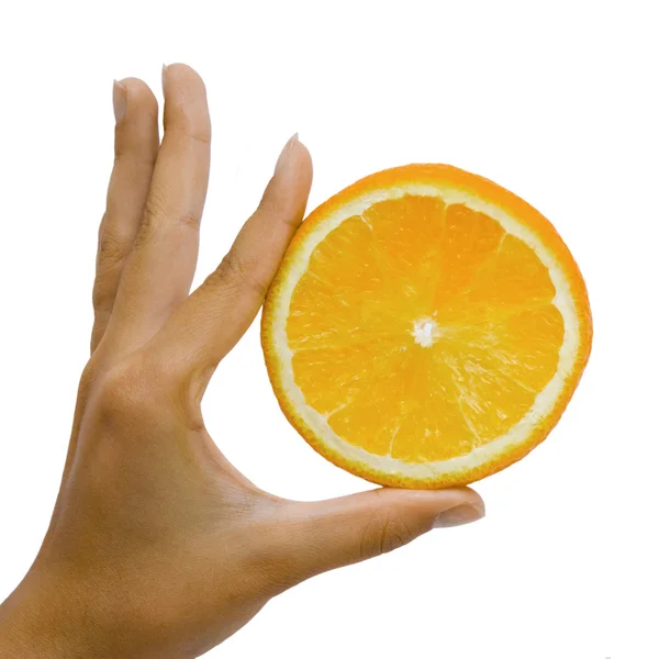 The orange in the hand on the white — Stock Photo, Image