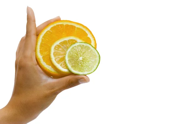 stock image Orange, lemon and lime in the hand on the white