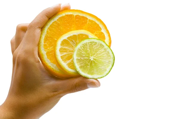 stock image Orange, lemon and lime in the hand on the white