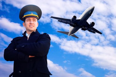 Pilot and airplane in the sky clipart