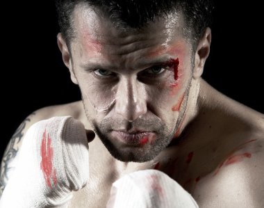 Aggressive boxer with blood on the face clipart