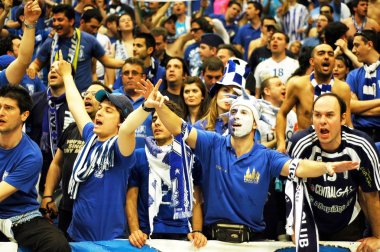 PRAGUE, CZECH REPUBLIC - APRIL 5: Iraklis team supporters watch clipart