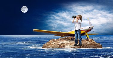 Child with airplane on the island in sea. clipart