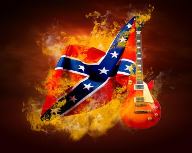 Yangın alevleri etrafında Rock bayrağı