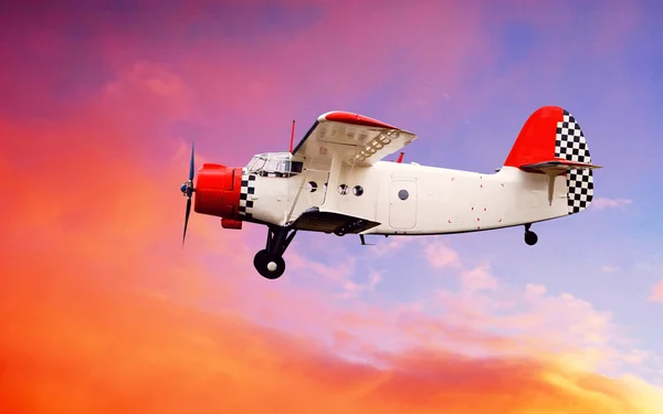 stock image Airplane on sunset sky