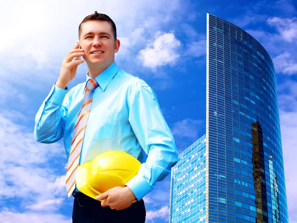 Businessman on the Modern business architecture background — Stock Photo, Image