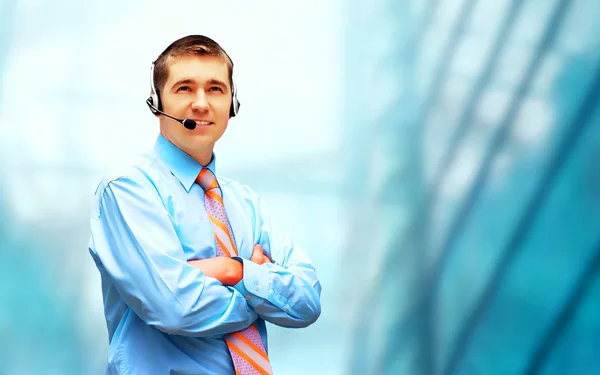 Happiness businessman in headphoness on the business architectur — Stock Photo, Image