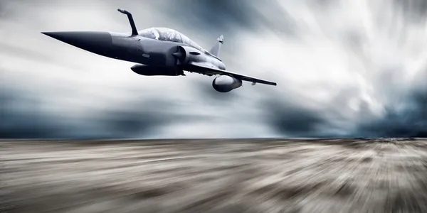 Plano aéreo militar sobre a velocidade — Fotografia de Stock