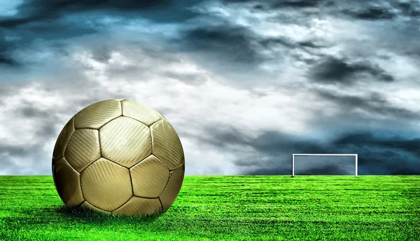 Soccer ball on green grass and sky background — Stock Photo, Image