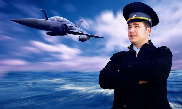 Пілот і військовий літак на швидкості — стокове фото
