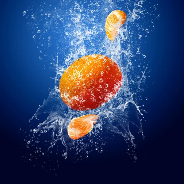 stock image Water drops around mandarin on blue background