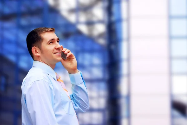 Businessman talking by phone — Stock Photo, Image