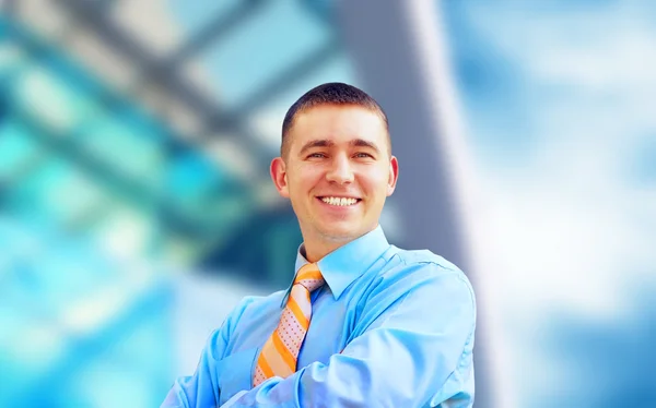 Happiness businessman on the business architecture background — Stock Photo, Image