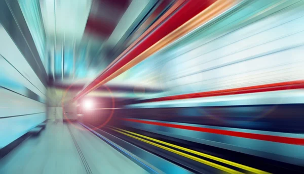Train on speed in railway station — Stock Photo, Image