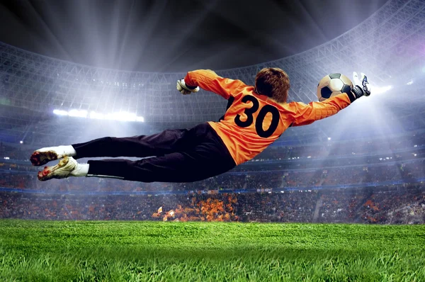 Football goalman on the stadium field — Stock Photo, Image