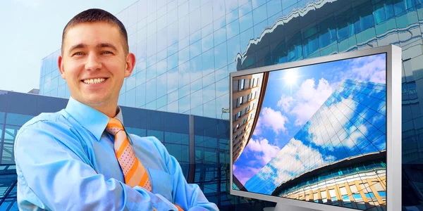 Businessman on architecture background — Stock Photo, Image