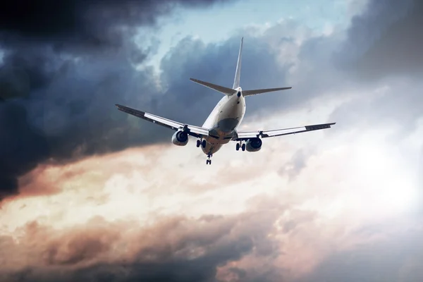 Airplane on the blue sky — Stock Photo, Image