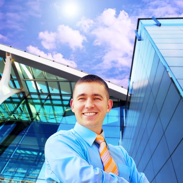 Happiness businessman on the business architecture background — Stock Photo, Image