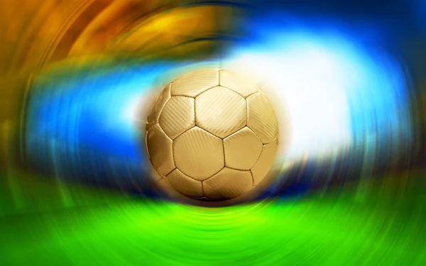 ぼかしスタジアム背景にサッカー ボール — ストック写真