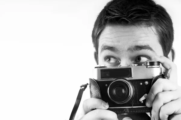 Lycka man med vintage fotokamera. — Stockfoto
