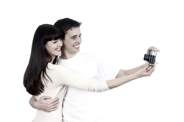 Joven pareja de belleza con cámara fotográfica aislada sobre fondo blanco — Foto de Stock