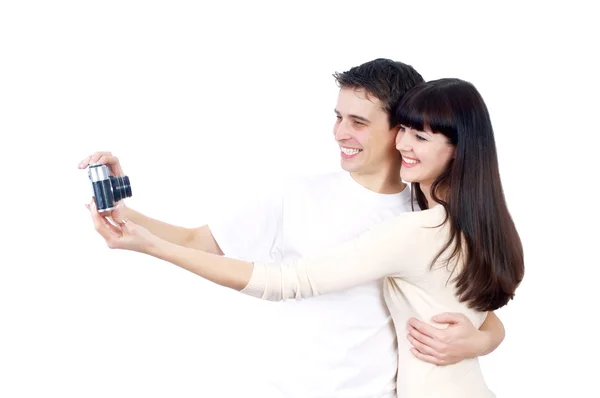 Joven pareja de belleza con cámara fotográfica aislada sobre fondo blanco — Foto de Stock