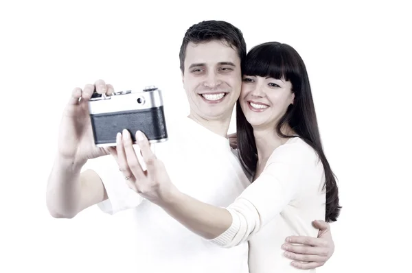 年轻美丽夫妇与照片相机上白色 backgrou 隔离 — 图库照片