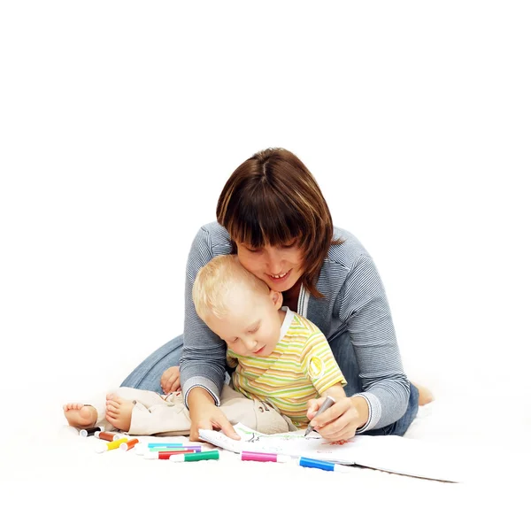 Ребенок счастья с родителями рисуют — стоковое фото