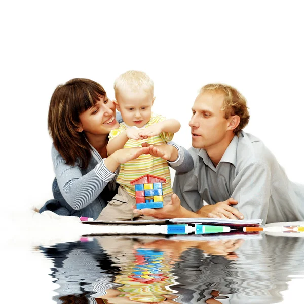 Geluk kind met ouders verf — Stockfoto