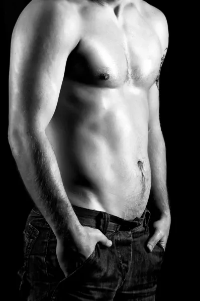 Naked muscular male model in jeans — Stock Photo, Image