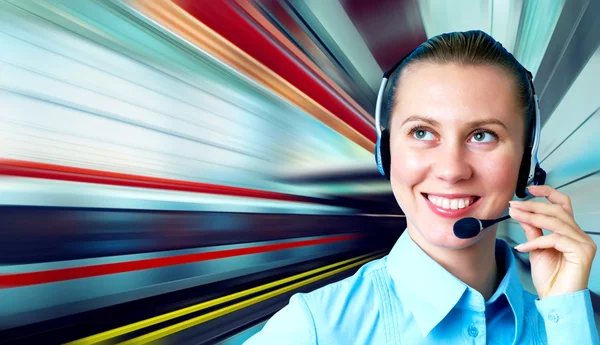 Businesswomen and train on speed in railway station — Stock Photo, Image