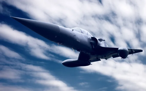 Militaire vliegtuig op de blauwe hemel — Stockfoto