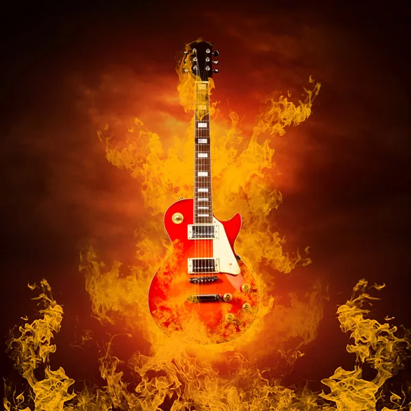 Rock guita v plameny ohně — Stock fotografie