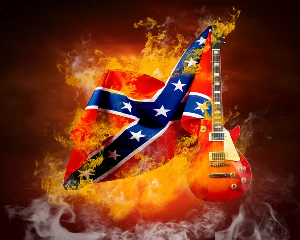Rock flag around fire flames — Stock Photo, Image