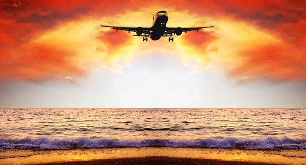 Beautiful sea nature landscape on the sunrise sky with airplane — Stock Photo, Image