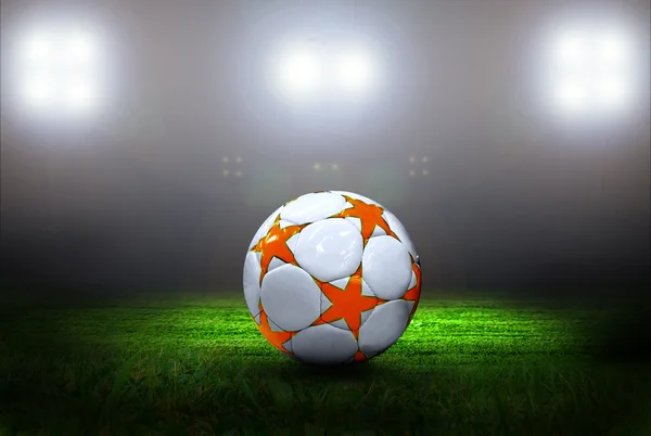 Bola de futebol no campo de estádio com luz Imagens De Bancos De Imagens Sem Royalties