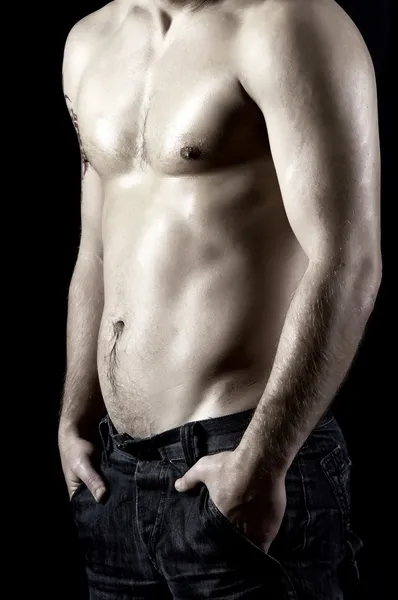 Modelo masculino muscular nu em jeans Imagem De Stock